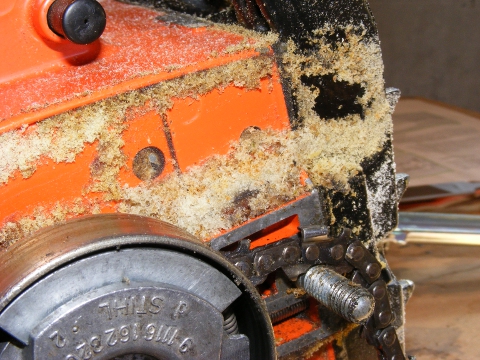 sawdust that indicates a chain needs to be sharpened
